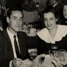 1950 image of Mr. and Mrs. Schurman dining.